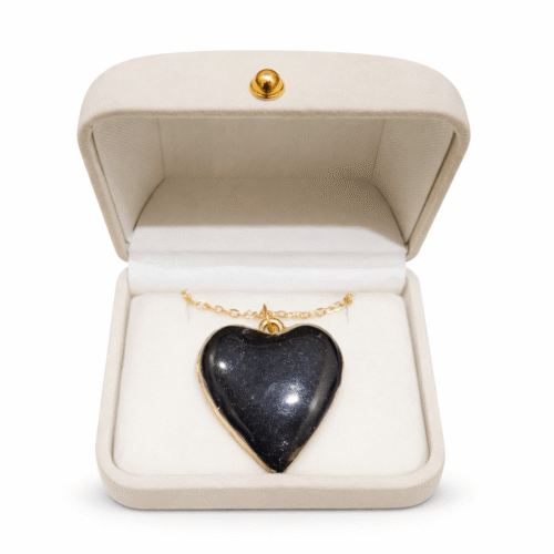 Ghilaf-e-Kaaba Heart Locket with sacred Kaaba fabric set in epoxy resin